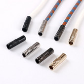 27,5 mm výška, reliéfny vzor vážky, zarážka, konce lana, viečko, sťahovacia šnúrka, prepínače, spona, oblečenie, šnúrky na topánky, doplnky.