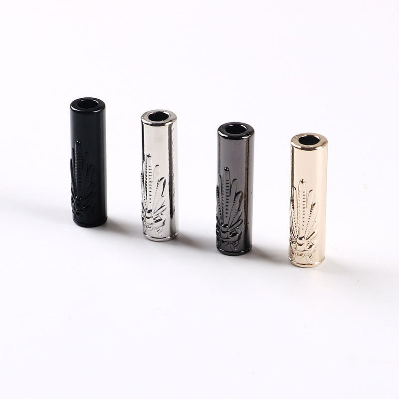 27,5 mm výška, reliéfny vzor vážky, zarážka, konce lana, viečko, sťahovacia šnúrka, prepínače, spona, oblečenie, šnúrky na topánky, doplnky.