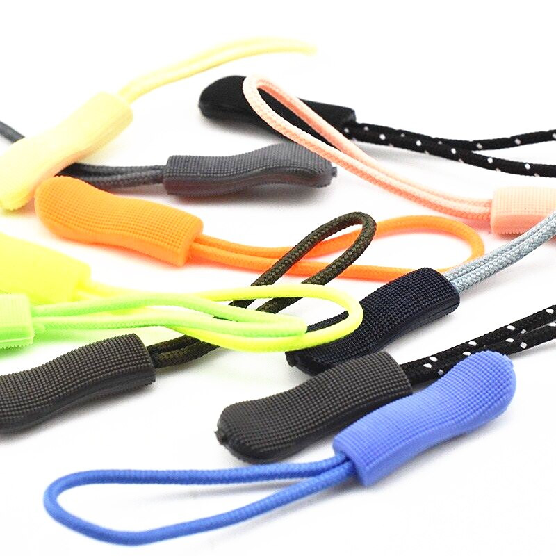 10 tk/pakend värvi tross Tõmblukk Pull Rõivaste kott Taktikaline seljakott Aksessuaarid Tõmbluku tõmbaja DIY tõmbluku pea nööri rihm Lariat liugur