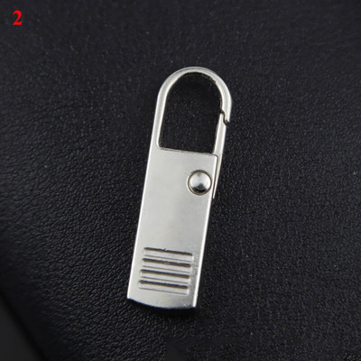 Vienspalvis pūkinės striukės paltas Užtrauktuko traukiklis Metalinis nuimamas užtrauktuko traukiklis Tvirtas patvarus krepšys Užtrauktukas Galvos Bagažo priedai