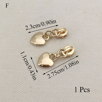 Vienspalvis pūkinės striukės paltas Užtrauktuko traukiklis Metalinis nuimamas užtrauktuko traukiklis Tvirtas patvarus krepšys Užtrauktukas Galvos Bagažo priedai