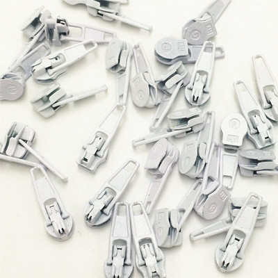 50 tk värvimismetallist tõmblukuga liugur nailontõmbluku jaoks 3#, mitmevärviline 3# nailonist tõmbluku tõmmits, isetegemise õmbluskomplektid