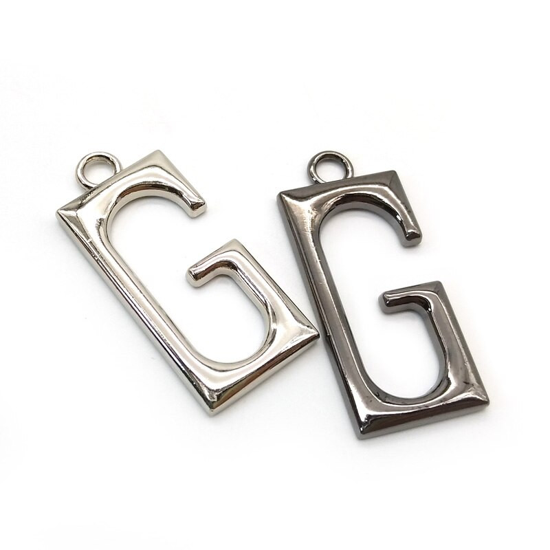 20 kom/lot, potpuno novi klizači za patent zatvarač za 5# i 8# s povlačenjem patentnog zatvarača slovom "G", modni dodaci za šivanje