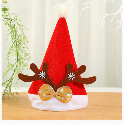 Pahuljasti božićni šešir Djeda Mraza s lijepom leptir mašnom Glava slatkog jelenjeg roga nosi se za božićne praznike, dar za djecu i odrasle