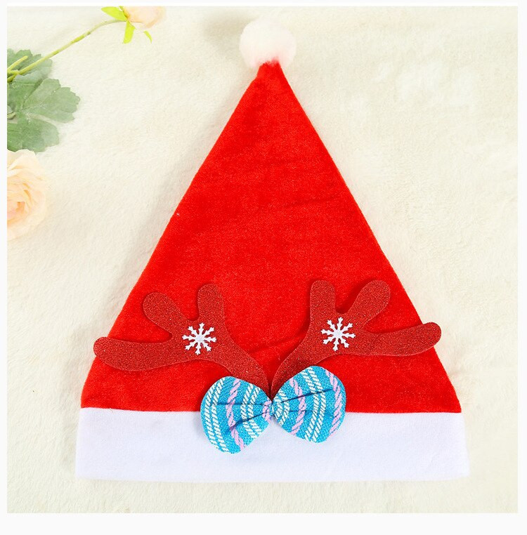 Pahuljasti božićni šešir Djeda Mraza s lijepom leptir mašnom Glava slatkog jelenjeg roga nosi se za božićne praznike, dar za djecu i odrasle
