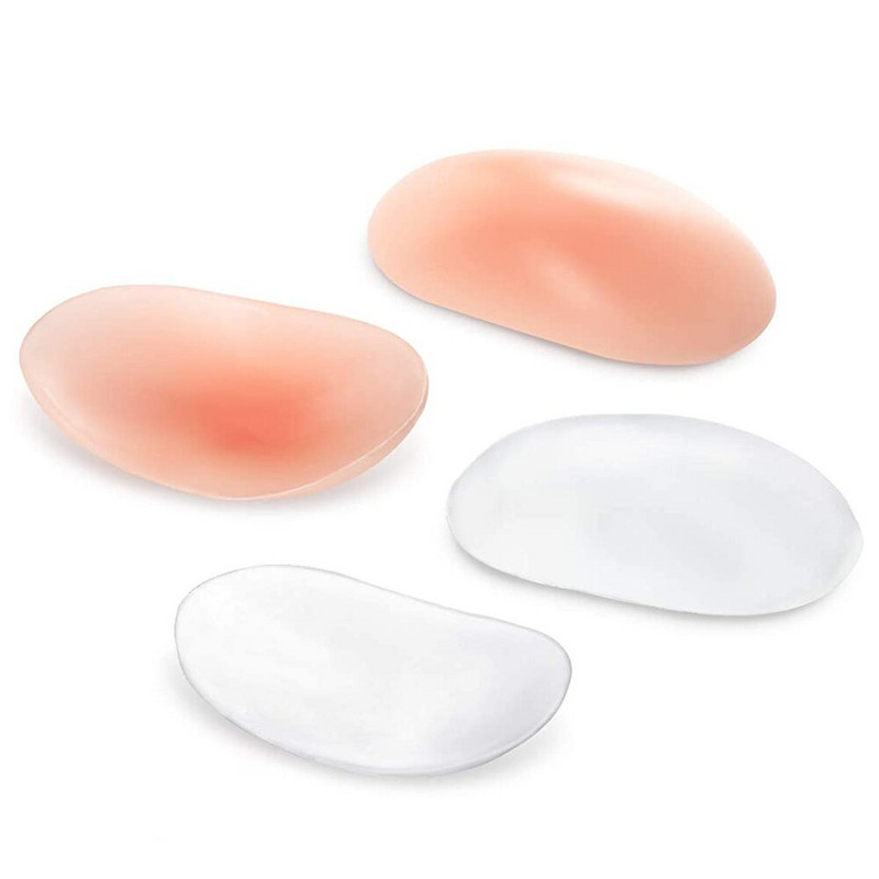 1 paar pehmest silikoonist õlapadjakesi, kleepuvaid libisemisvastaseid korduvkasutatavaid õlapatju naiste rõivaste tarvikute jaoks