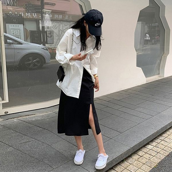 Дамска пола с цепка и широк колан 