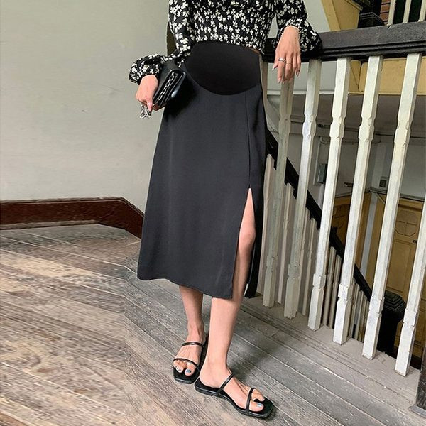 Дамска пола с цепка и широк колан 