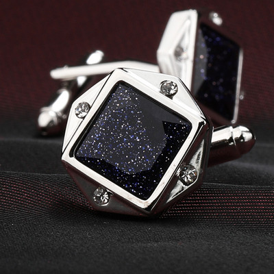 Men`s cufflinks with a square decorative stone