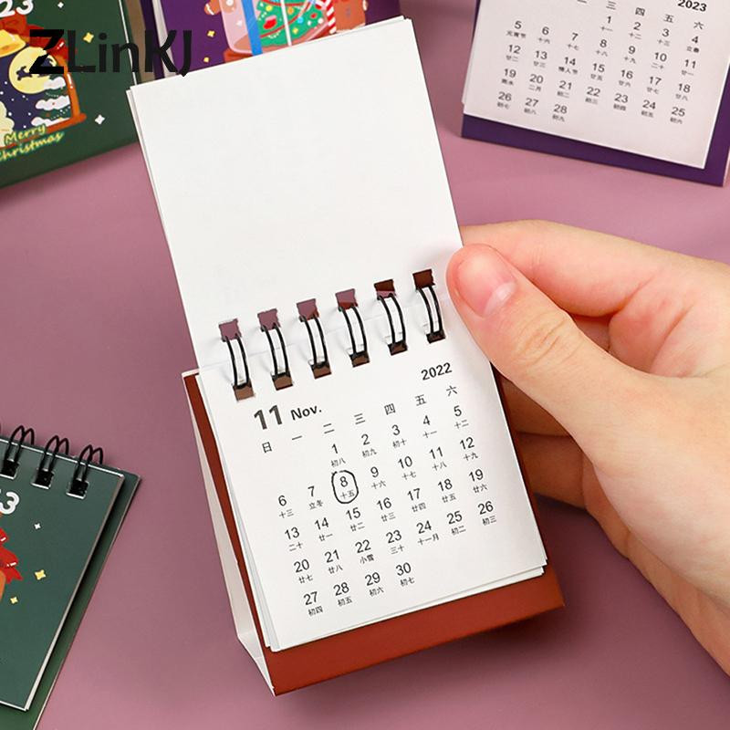 2023. gada Ziemassvētku galda kalendārs, stāvošs pārslēgts no 2022. gada augusta līdz 2023. gada decembrim darbvirsmas kalendārs multfilmu pārnēsājamais mini galda kalendārs