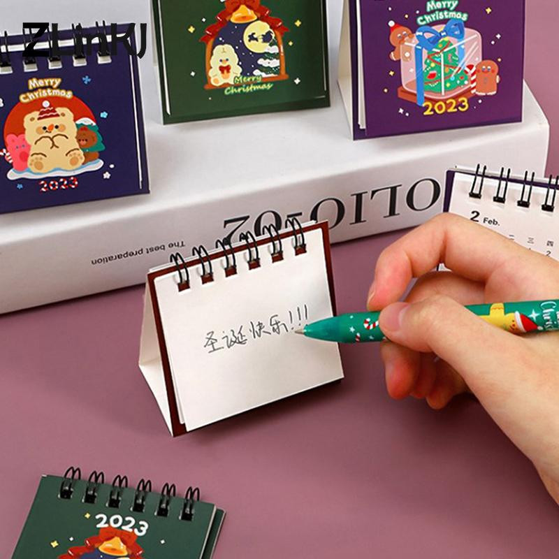2023. gada Ziemassvētku galda kalendārs, stāvošs pārslēgts no 2022. gada augusta līdz 2023. gada decembrim darbvirsmas kalendārs multfilmu pārnēsājamais mini galda kalendārs
