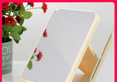 Women`s portable folding cosmetic mirror