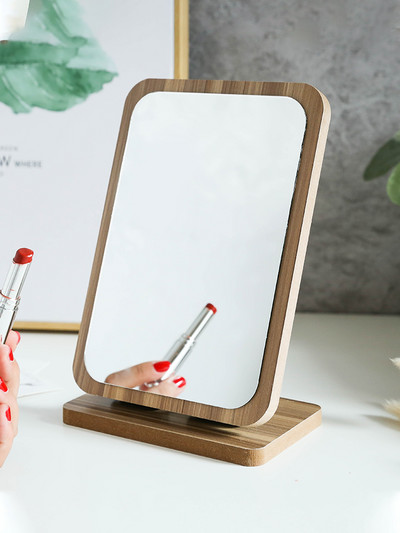 Cosmetic mirror with wooden stand