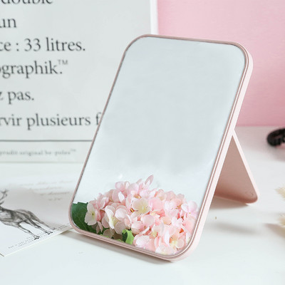 Cosmetic mirror with stand in several colors