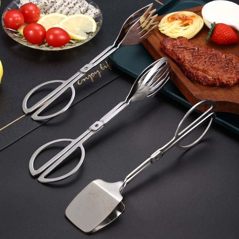 Roostevabast terasest kääritüüpi grilltangid salatikoogid leivaklambrid praad Rootsi lauas BBQ toidu valimise tööriist Köögis kasutatavad küpsetusvidinad