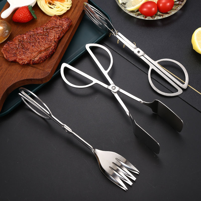 Roostevabast terasest kääritüüpi grilltangid salatikoogid leivaklambrid praad Rootsi lauas BBQ toidu valimise tööriist Köögis kasutatavad küpsetusvidinad