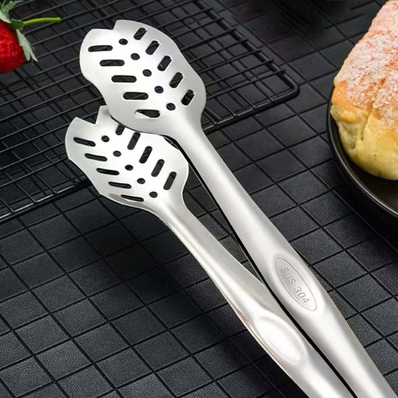 Roostevabast terasest toidutangid Kööginõud Rootsi lauas toiduvalmistamise tööriist Kuumusevastased klambrid