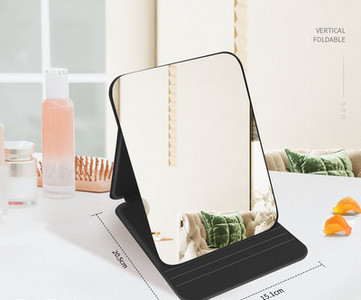 Mitmes värvitoonis kosmeetikapeegel alusega