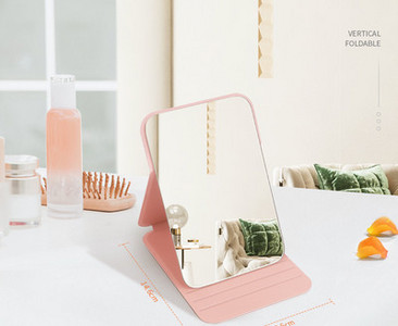 Mitmes värvitoonis kosmeetikapeegel alusega