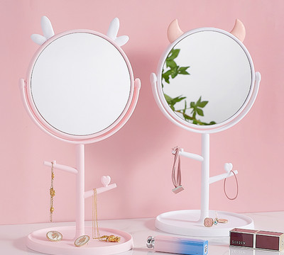 Portable cosmetic mirror on a stand