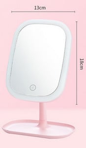 Naiste kosmeetiline peegel alusel