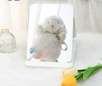 Kaasaskantav kandiline kosmeetiline peegel