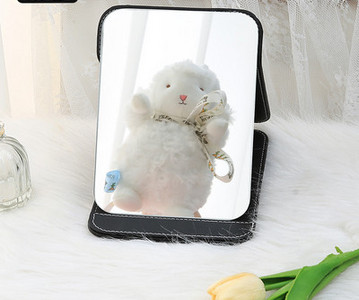 Kaasaskantav kandiline kosmeetiline peegel