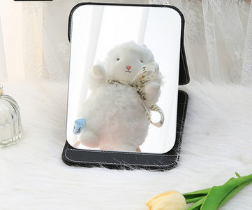 Kaasaskantav kandiline kosmeetiline peegel