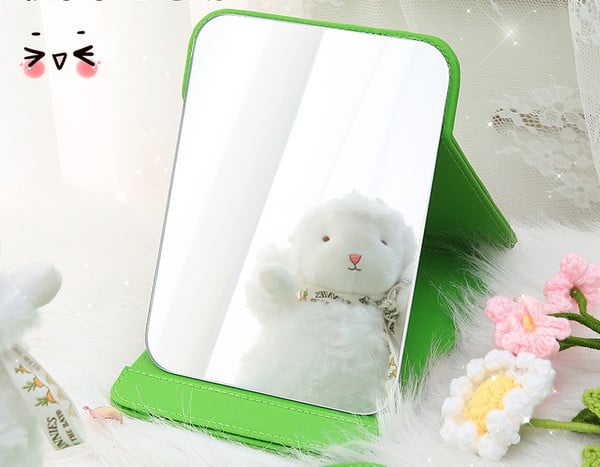 Kaasaskantav kandiline kosmeetiline peegel