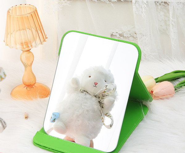 Kaasaskantav kandiline kosmeetiline peegel