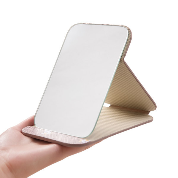 Kokkupandav kosmeetiline peegel koos aplikatsiooniga