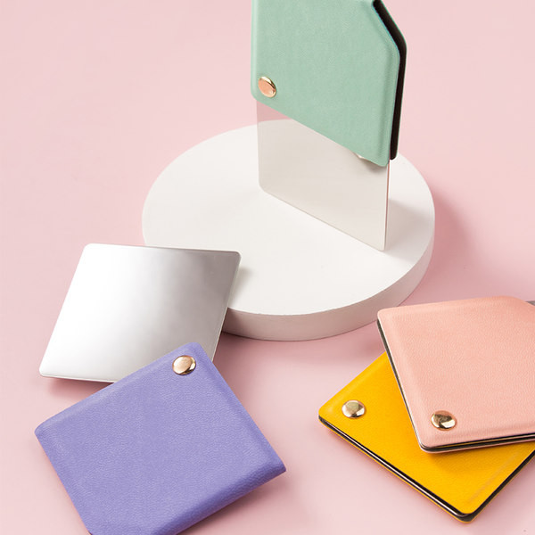 Kaasaskantav kandiline peegel