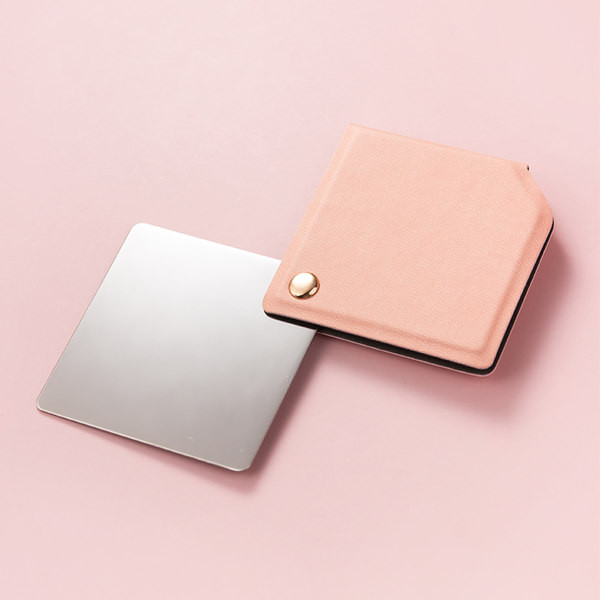 Kaasaskantav kandiline peegel