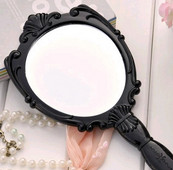 Kozmetičko ogledalo s ručkom