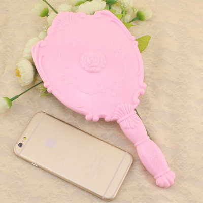 Kozmetičko ogledalo s ručkom