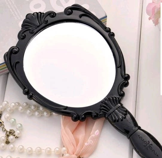 Kozmetičko ogledalo s ručkom