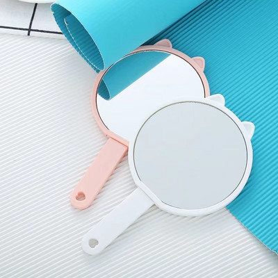 Žensko prijenosno ogledalo s ručkom