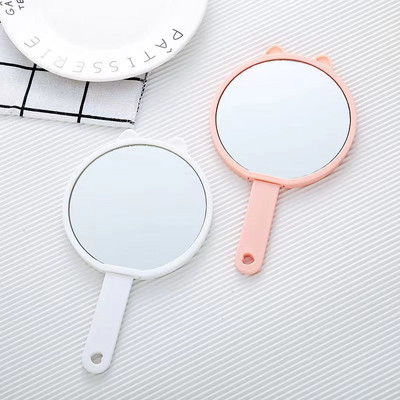 Žensko prijenosno ogledalo s ručkom