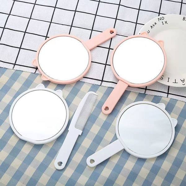 Žensko prijenosno ogledalo s ručkom