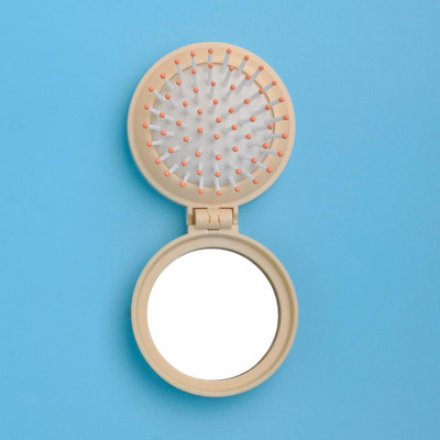 Žensko sklopivo ogledalo s češljem