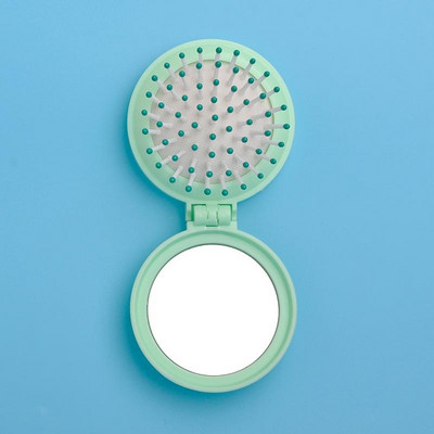 Žensko sklopivo ogledalo s češljem
