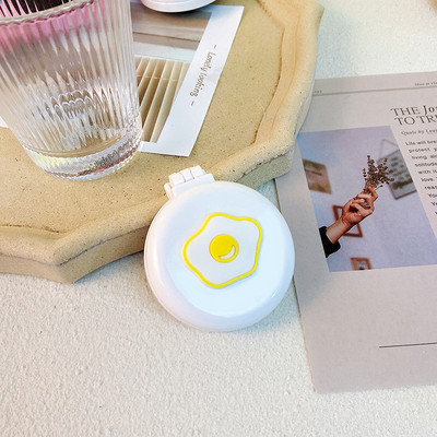 Žensko sklopivo ogledalo s češljem