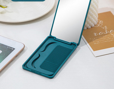 Преносимо малко огледало с гребен