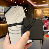 Žensko preklopno crno ogledalo