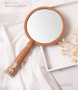 Ručno okruglo ogledalo s ručkom
