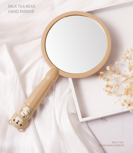 Ručno okruglo ogledalo s ručkom