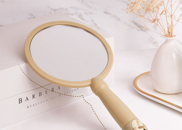 Ručno okruglo ogledalo s ručkom