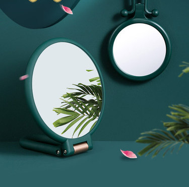 Dvostrano žensko ogledalo sa stalkom