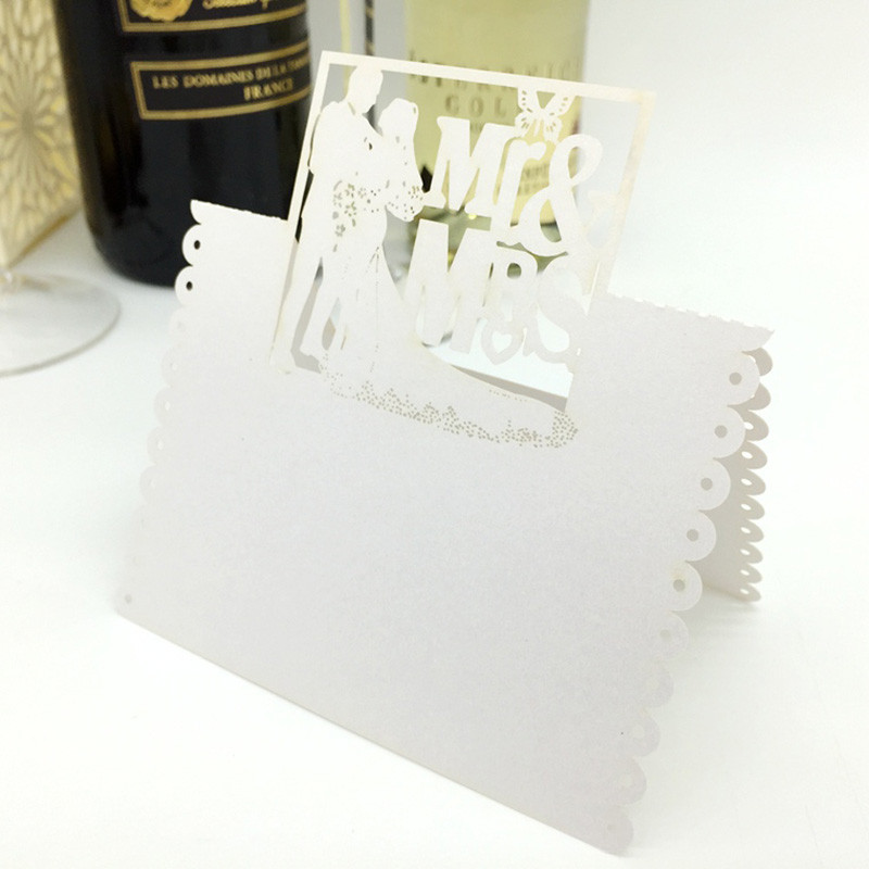 100 tk valge laserlõikuse armastajad pruut ja peigmees härra ja proua isetegemise tabel Nimi kohakaardid pulmakaunistus Sündmus Peotarbed Sisustus