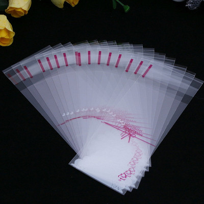 100tk/partii Mini plastikküpsise pakend 5x10cm koogipakendite kotid opp isekleepuvad kotid kingikott kommikott huulepulga pakend